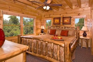 Moonstruck bedroom view of Smoky Mountain cabin with hot tub
